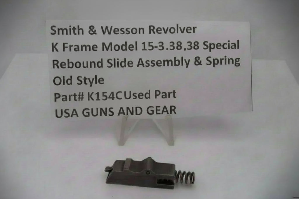 Smith & Wesson revolver K Frame Model 12 .38 Special rebound slide assembly & spring on a white background with text label.