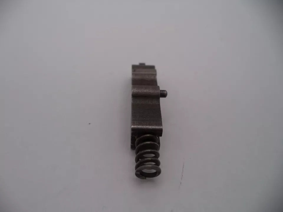 Metal spring and component on a white background