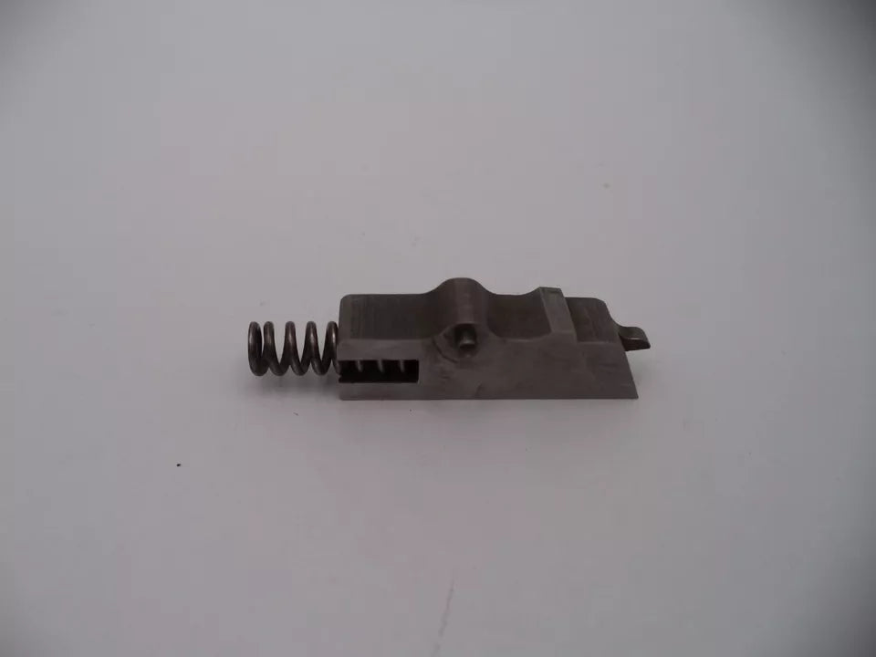 Mechanical component with a spring on a white background