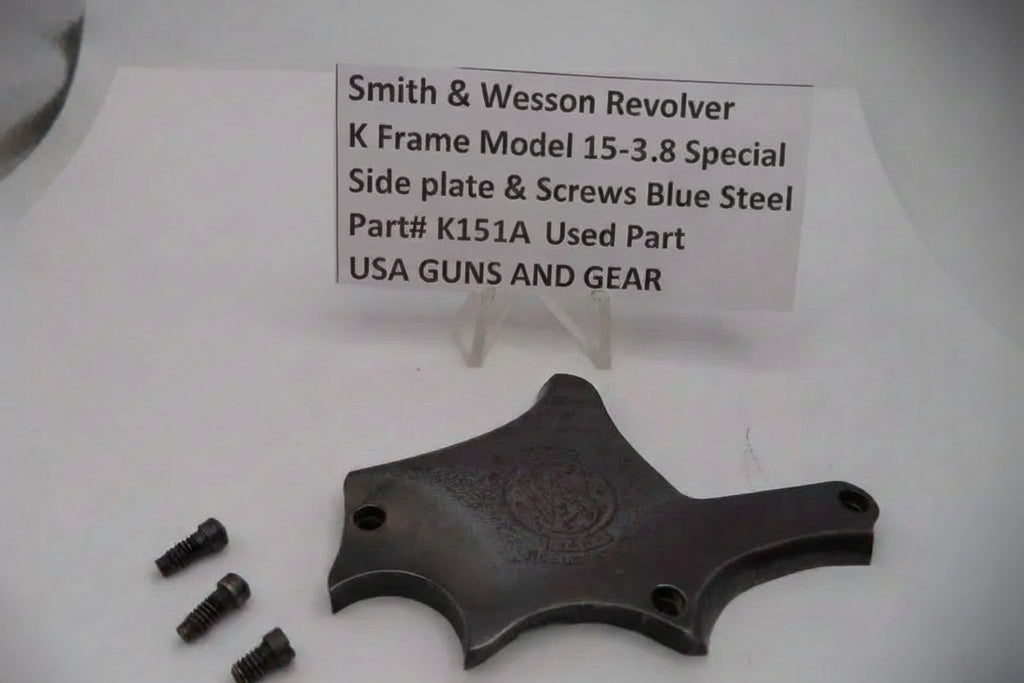 Smith & Wesson revolver K Frame Model 15 .38 Special side plate and screws on a white background with a label.