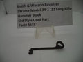Smith & Wesson J Frame Model 34-1 Hammer Block for .22 Long Rifle displayed on a white surface with a label providing product details.