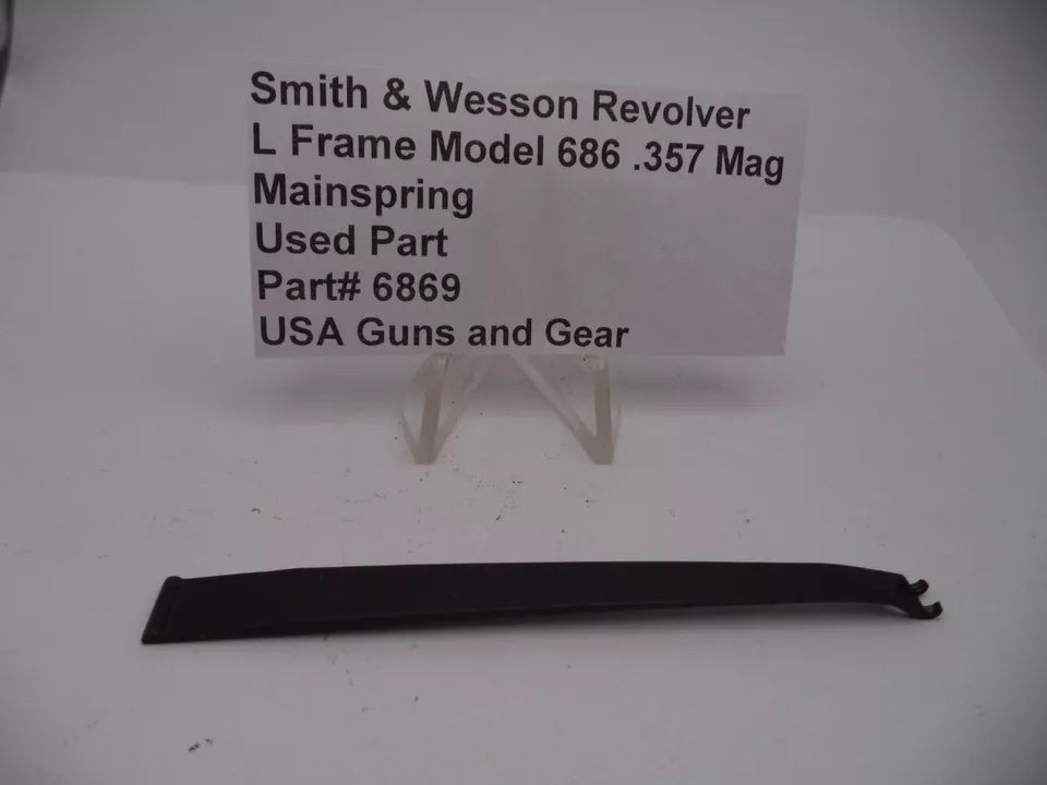 Smith & Wesson L Frame Model 686 .357 Mag Mainspring, used part, displayed on a white surface with a label detailing the product information.