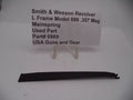 Smith & Wesson L Frame Model 686 .357 Mag Mainspring, used part, displayed on a white surface with a label detailing the product information.