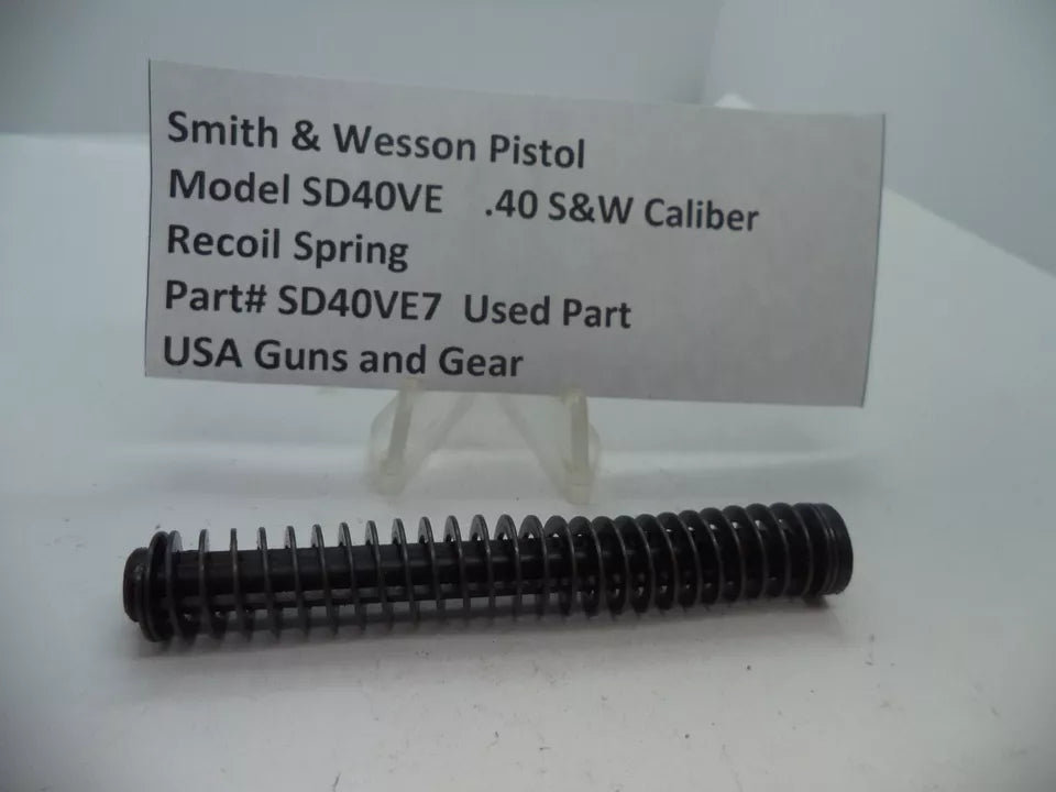 Smith & Wesson Pistol Model SD40 VE Recoil Spring for .40 S&W displayed on a white surface with an information sign indicating the model, caliber, part number, and usage status as used part.