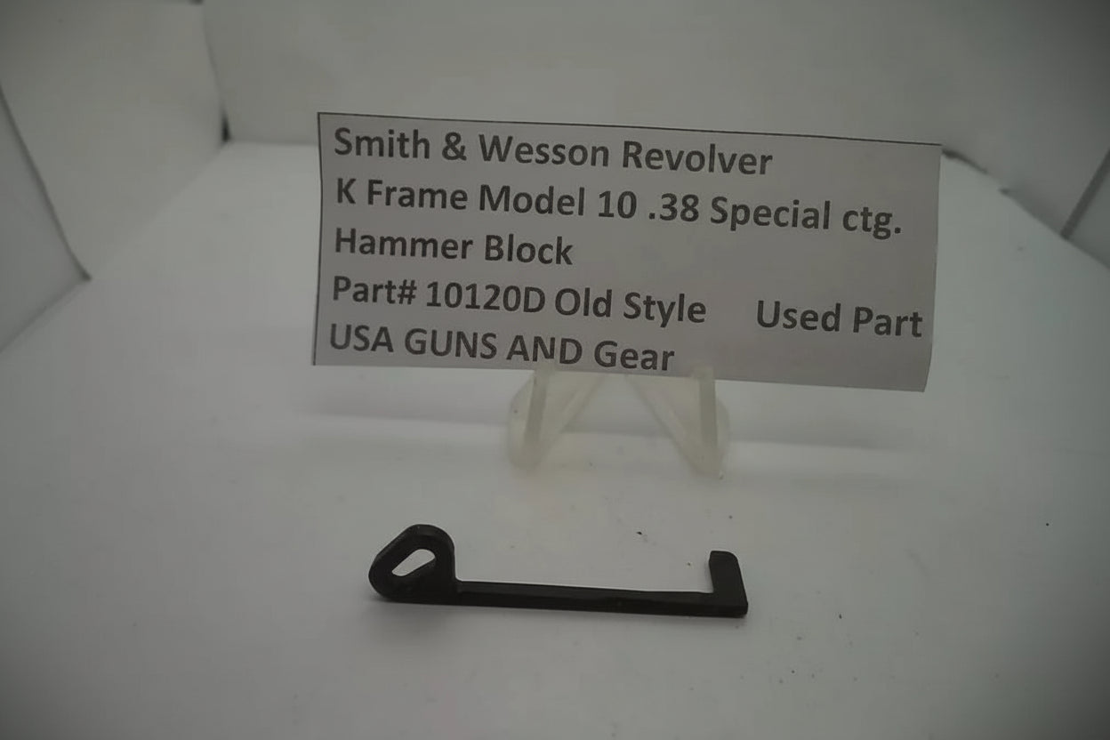 Smith & Wesson revolver part on a white background with a label