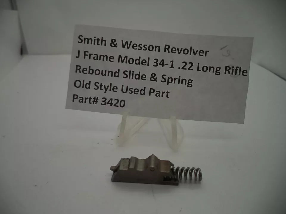 Smith & Wesson J Frame Model 34-1 Rebound Slide & Spring for .22 Long Rifle displayed on a white surface with a descriptive label.
