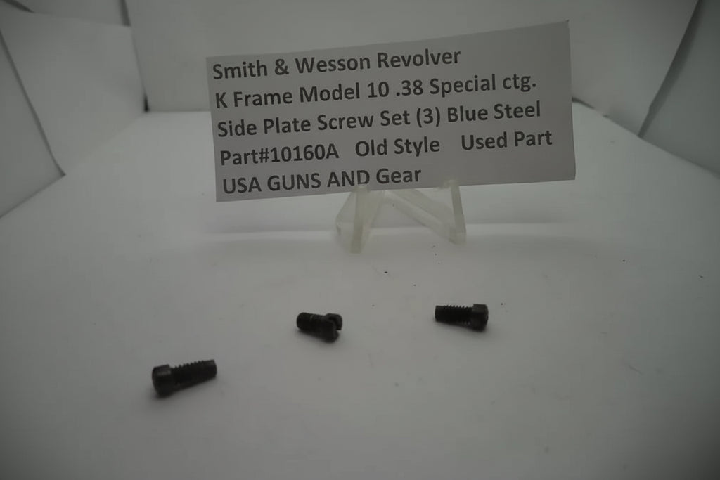 Three black screws on a white surface with a label indicating they are for a Smith & Wesson revolver.