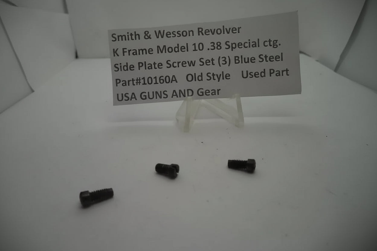 Three black screws on a white surface with a label indicating they are for a Smith & Wesson revolver.
