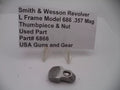Smith & Wesson L Frame Model 686 .357 Mag Thumbpiece & Nut Used Part Displayed with a Sign indicating the Model and Caliber