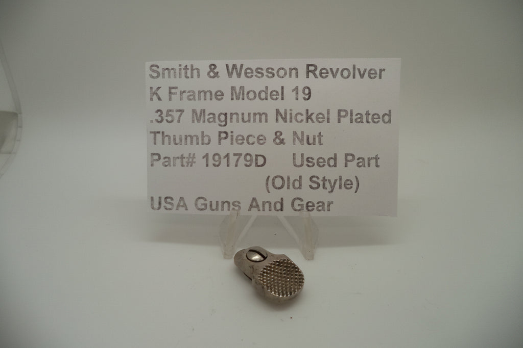 Smith & Wesson K Frame Model 19 revolver part, showing the thumb piece and nut used for ejecting spent cartridges. The part is nickel-plated and shows signs of wear.