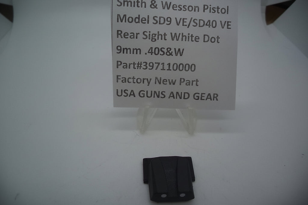 A black rear sight for a Smith & Wesson pistol, displayed on a white background with a label providing product details.