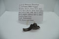 Smith & Wesson revolver trigger part with model number 228690000 displayed on a label.