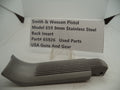 A stainless steel back insert part labeled as 'Smith & Wesson Pistol Model 659 Stainless Steel' with the text 'BACK INSERT' and 'PART 65926' displayed on a label.