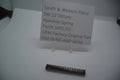 Smith & Wesson Pistol SW 22 Victory Hammer Spring, part number 3001350, displayed on a white surface with an information sign indicating price and model details.