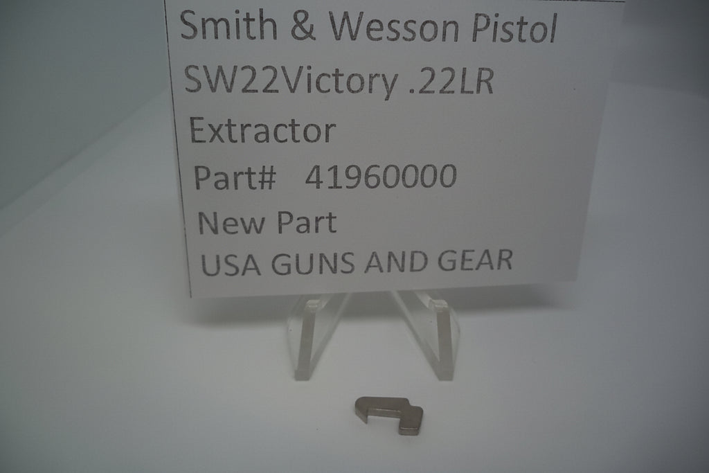 A Smith & Wesson SW22 Victory .22 LR Extractor displayed on a stand with a label indicating the part number, model, and price.