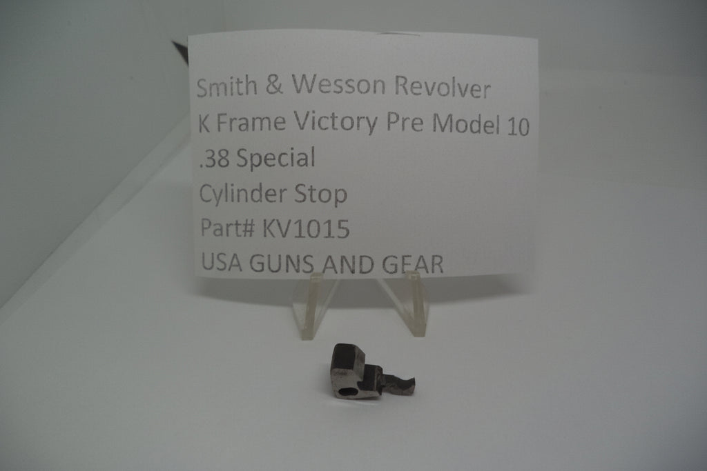 A metal cylinder stop for a Smith & Wesson revolver, displayed on a white background with a label providing product information.