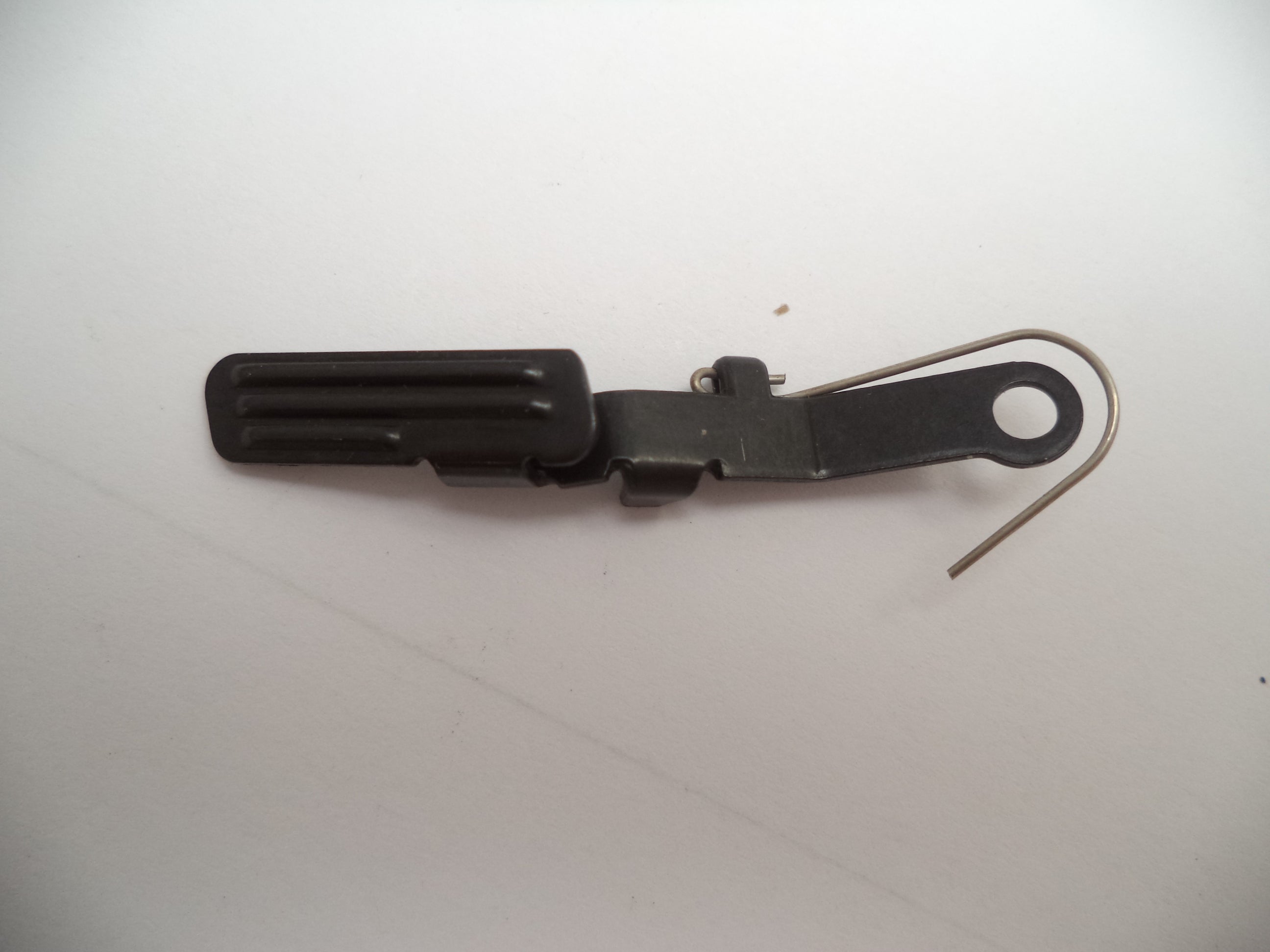 250650000 Smith & Wesson Slide Stop Release Pistol Part