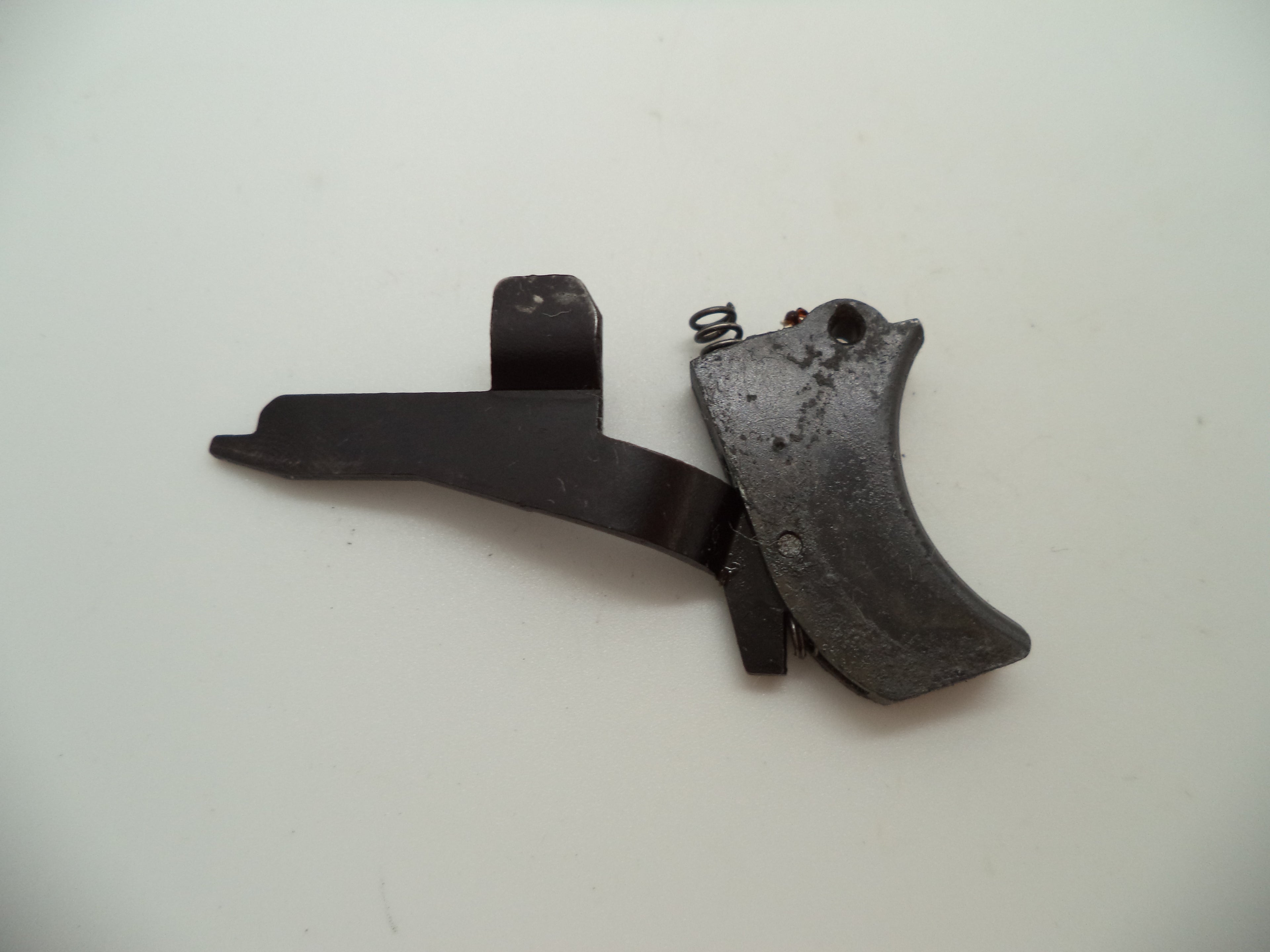 R13 Raven Arms Pistol Model MP-25 Used Trigger Assembly & Spring 25 ACP