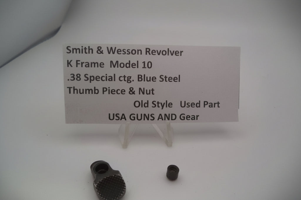 Smith & Wesson revolver parts with a label on a white background