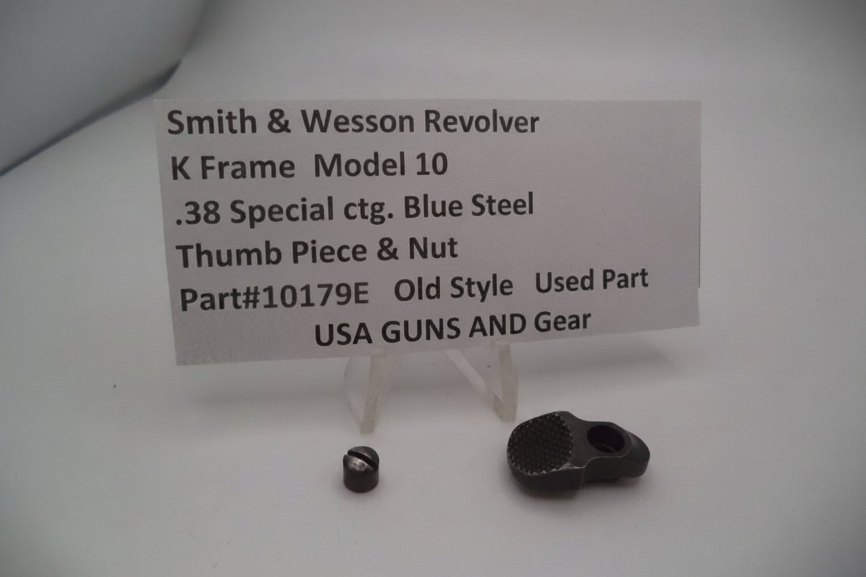 Smith & Wesson revolver parts with a label on a white background