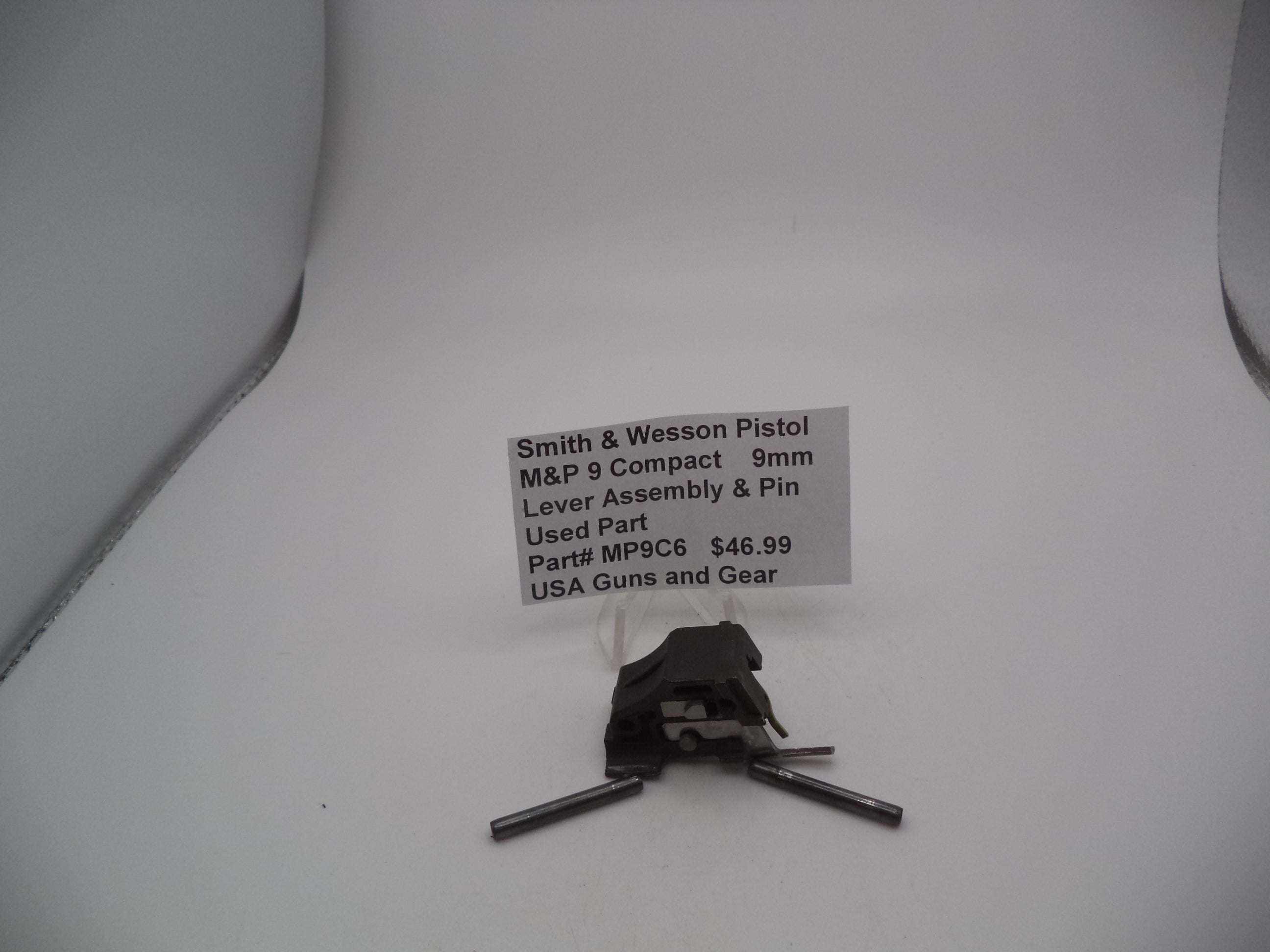 Smith & Wesson Pistol M&P 9 Compact 9mm Lever Assembly & Pin displayed on a white background with a price tag showing.