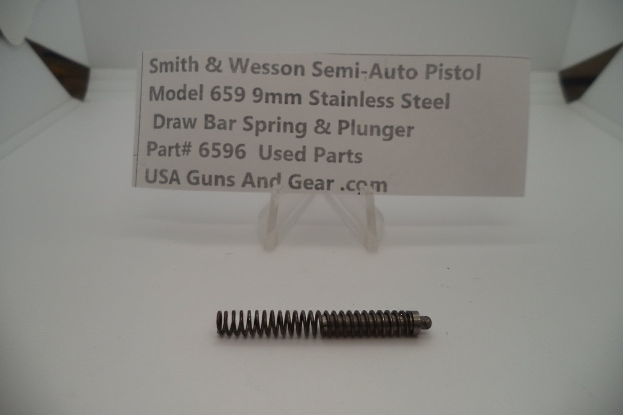 The image shows a Smith & Wesson Model 659 stainless steel draw bar spring and plunger, used parts for an auto pistol.