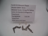 69044 Smith & Wesson Pistol Model 6904 9mm Release Lever, Firing Pin Safety Lever and Ejector & Magazine Depressor Used