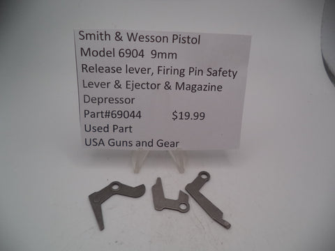 69044 Smith & Wesson Pistol Model 6904 9mm Release Lever, Firing Pin Safety Lever and Ejector & Magazine Depressor Used