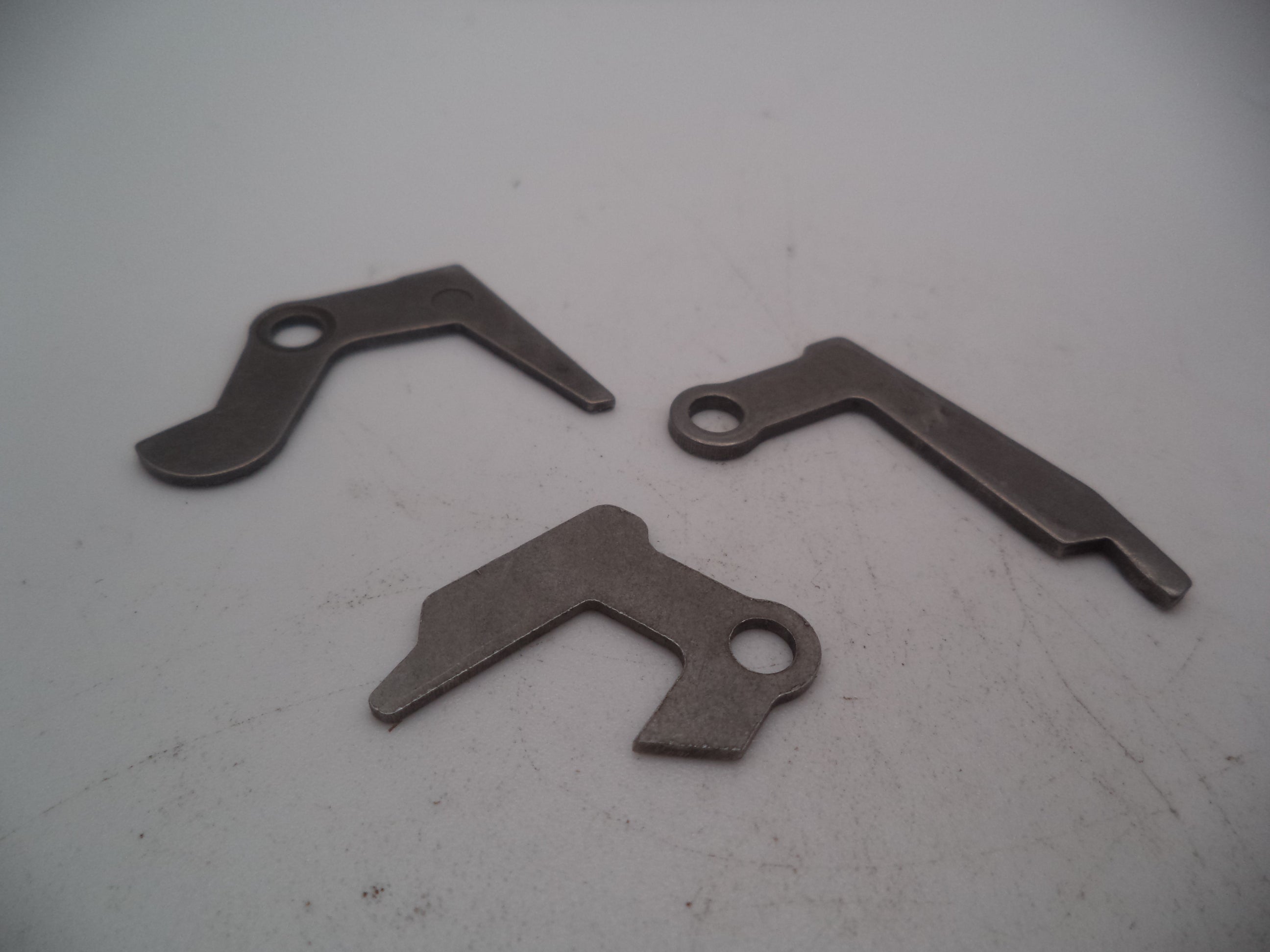 69044 Smith & Wesson Pistol Model 6904 9mm Release Lever, Firing Pin Safety Lever and Ejector & Magazine Depressor Used