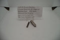 Smith & Wesson K Frame Model 66 Revolver.357 Magnum Stainless Steel Rebound Slide & Spring used part displayed on a white background with product information sign.