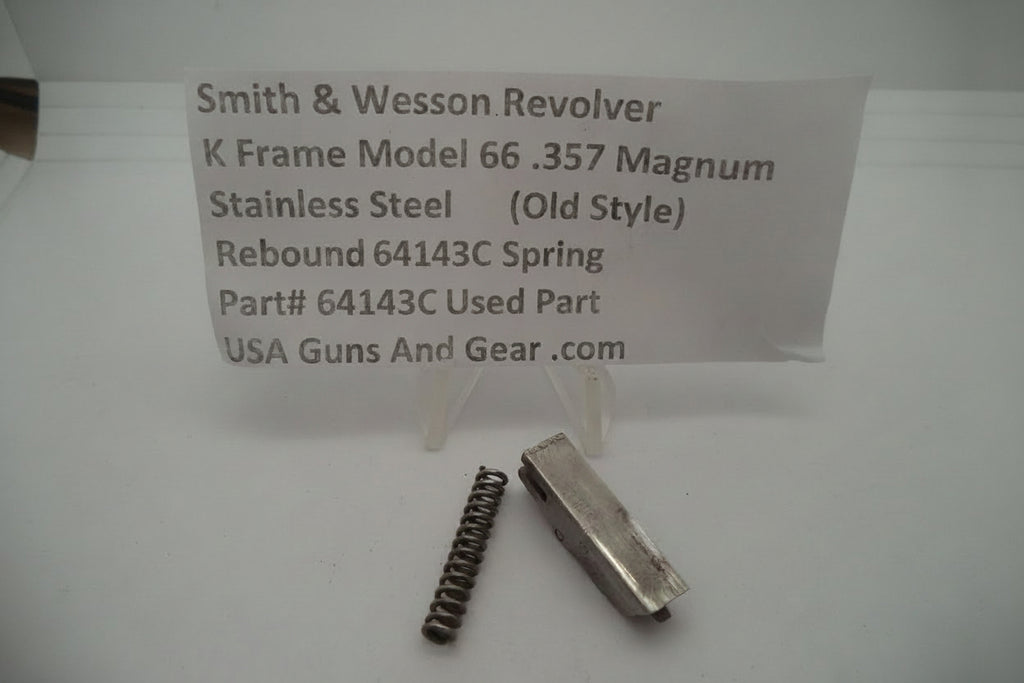 Smith & Wesson revolver parts including a slide and spring on a white background with a descriptive card.
