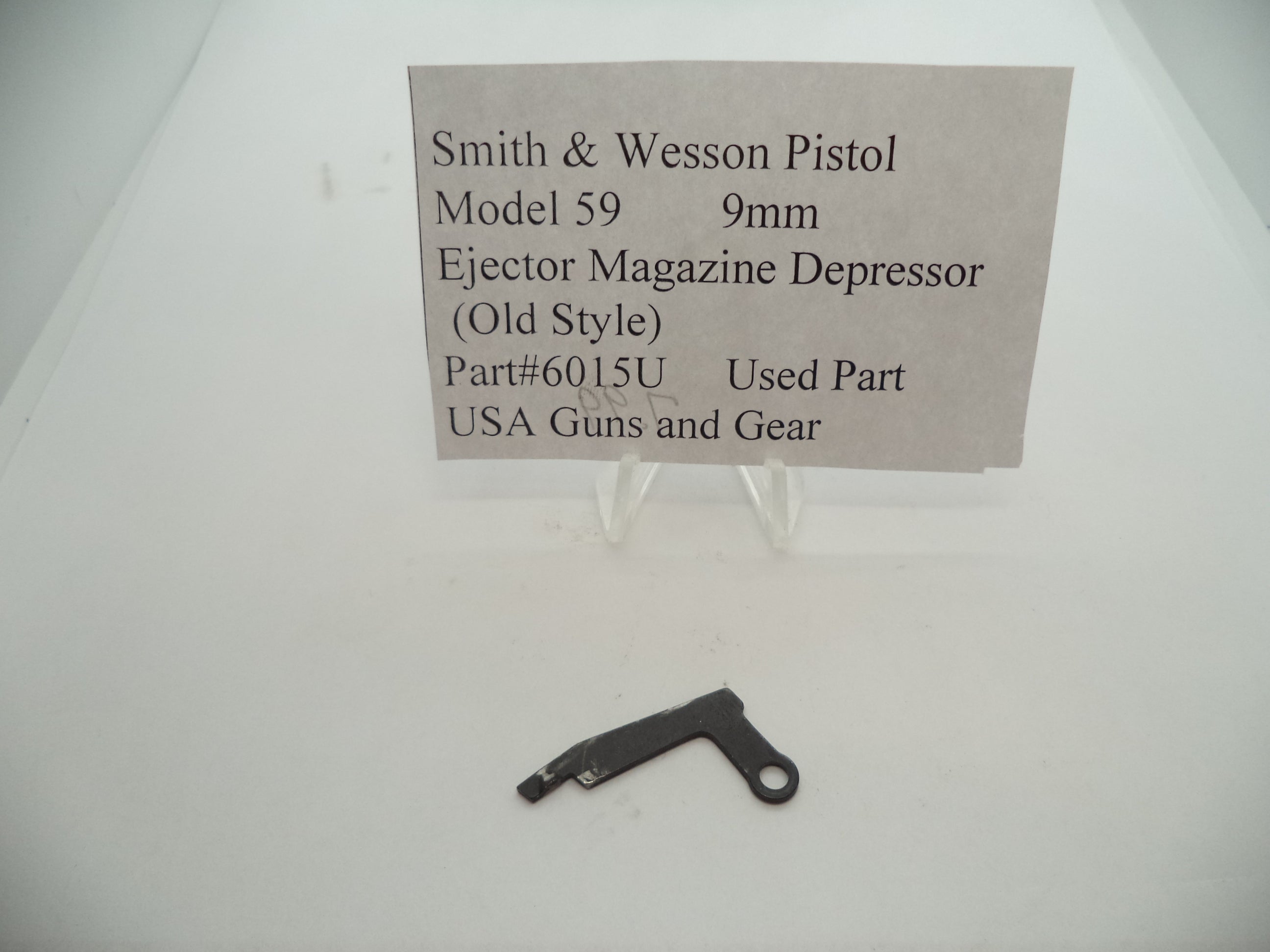 6015U Smith & Wesson Pistol Model 59 9MM Ejector Magazine Depressor Used Part