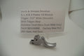 Smith & Wesson revolver part labelled as 'K L N X' with a price tag indicating it is a factory new part made of stainless steel, designed for all models with a trigger stop feature.
