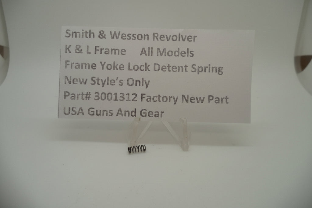 The image shows a Smith & Wesson revolver frame yoke lock detent spring, indicating it is a factory new part for all models of Smith & Wesson revolvers.