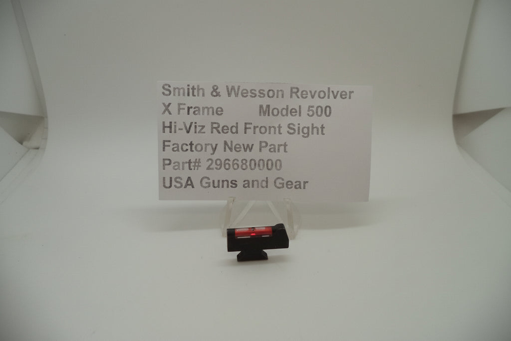 A red front sight for a Smith & Wesson X Frame Model 500 revolver, displayed on a white background with product information sign.